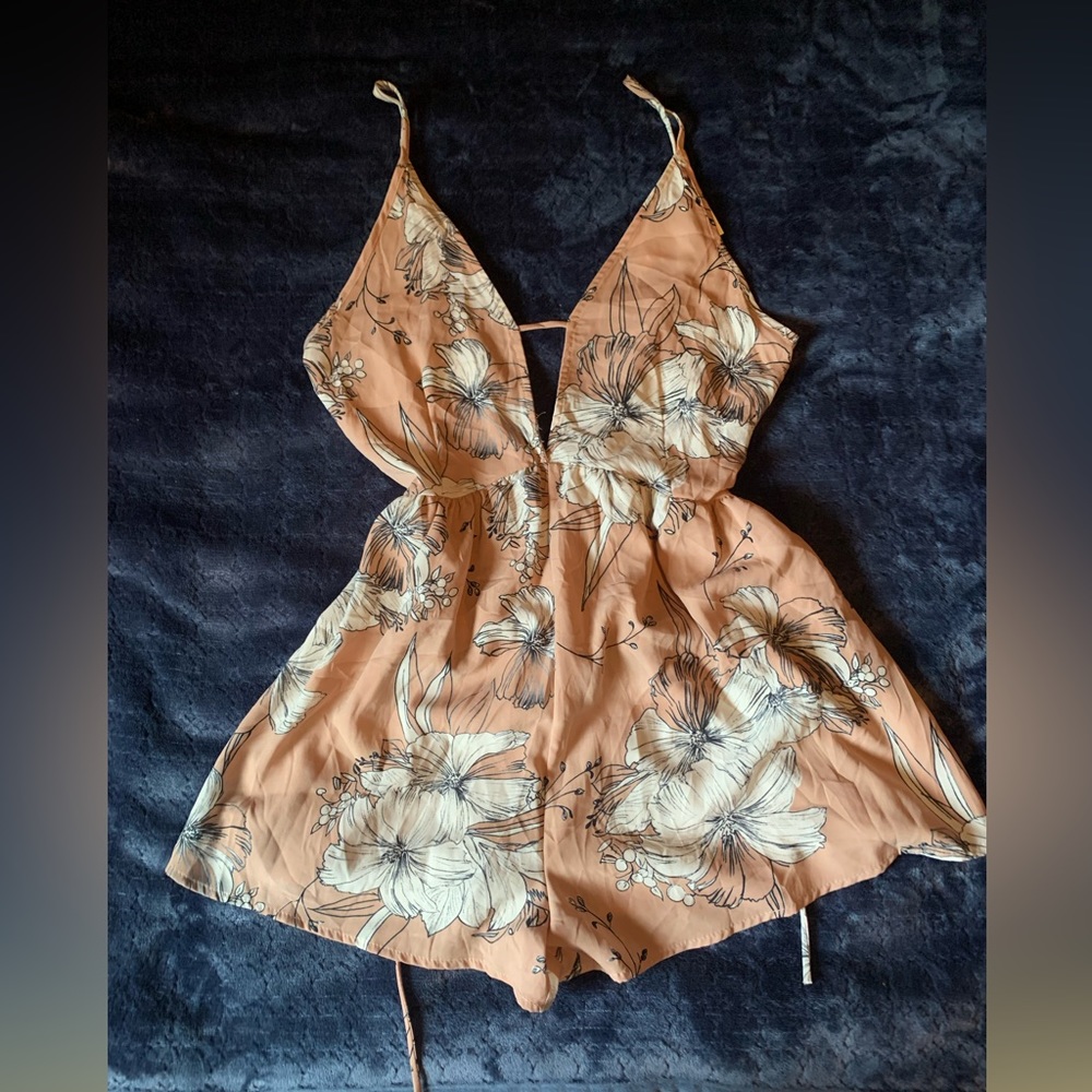 Romper. Never worn. Pink floral